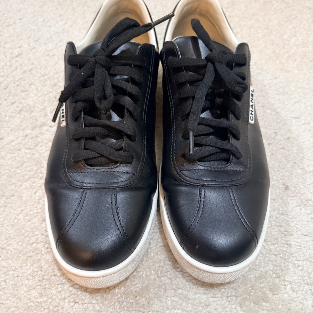 CHANEL Black Leather Low-Top Sneakers with White Sole Accent - Picture 2 of 14
